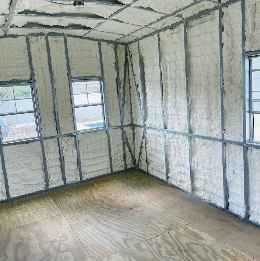 Closed-cell spray foam insulation applied to wall cavities in a residential project in Cypress